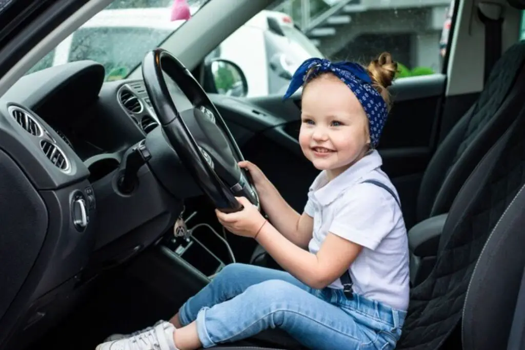 When can kids sit in the front seat